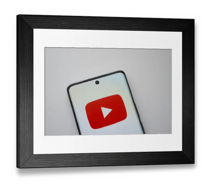 Framed Print : Dhaka, Bangladesh- 10 July 2025: Youtube app is displayed on a smartphone screen Framed Print : Dhaka, Bangladesh- 10 July 2025: Youtube app is displayed on a smartphone screen