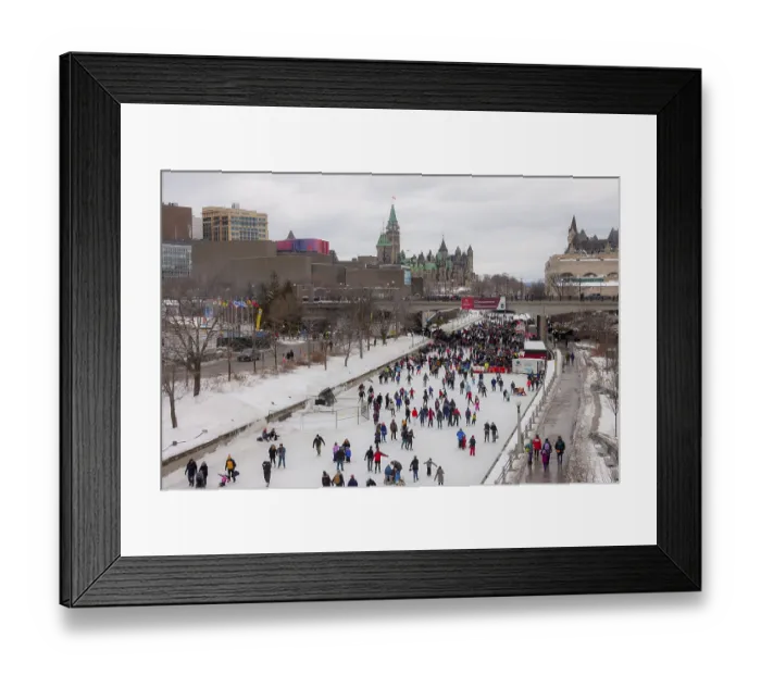 Framed Print : Crowded winter ice rink of the Rideau Canal in a cityscape with historical architecture