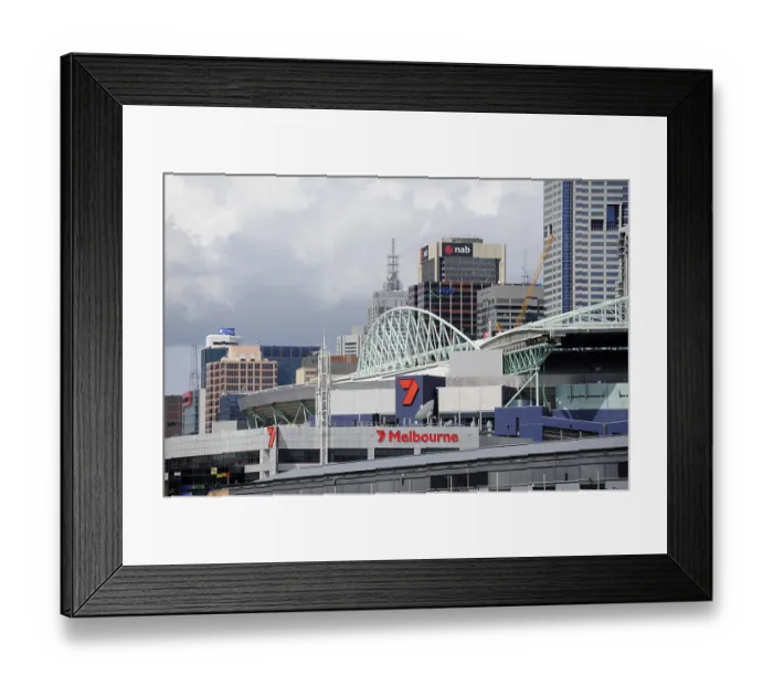 Framed Print : Docklands, view of the Etihad Stadium and buildings in the city centre Framed Print : Docklands, view of the Etihad Stadium and buildings in the city centre