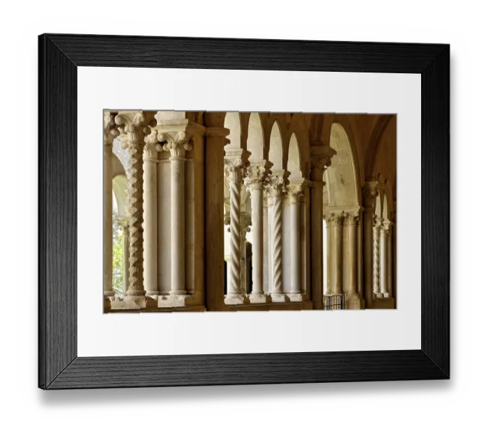 Framed Print : Slender Gothic columns, double columns with filigree capitals in the cloister Framed Print : Slender Gothic columns, double columns with filigree capitals in the cloister