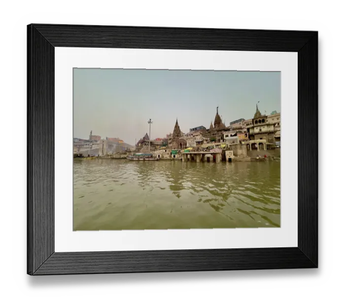 Framed Print : View of the city by the river in the calm morning light