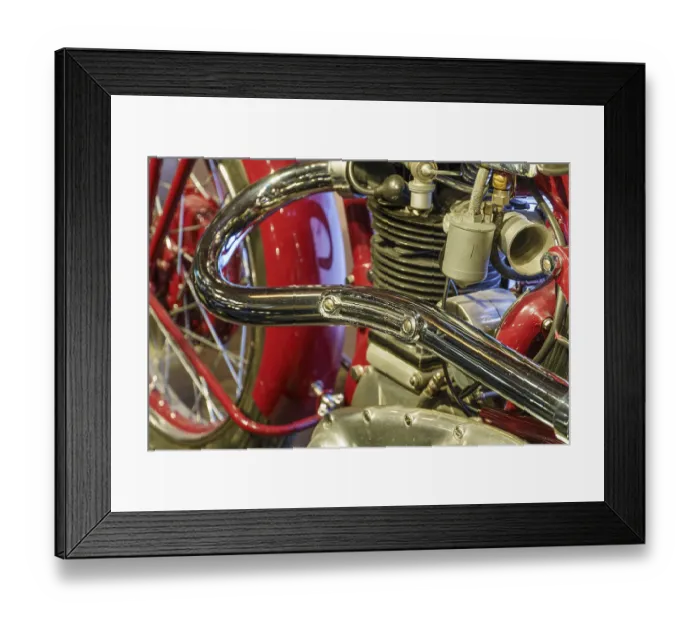 Framed Print : Close-up of a red motorbike with shiny exhaust and engine Framed Print : Close-up of a red motorbike with shiny exhaust and engine