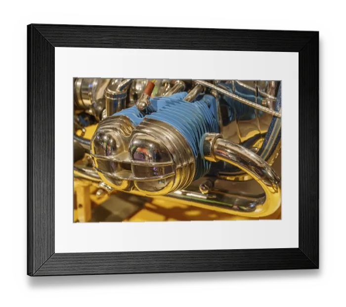 Framed Print : Close-up of a shiny motorbike with blue and chrome-coloured elements Framed Print : Close-up of a shiny motorbike with blue and chrome-coloured elements