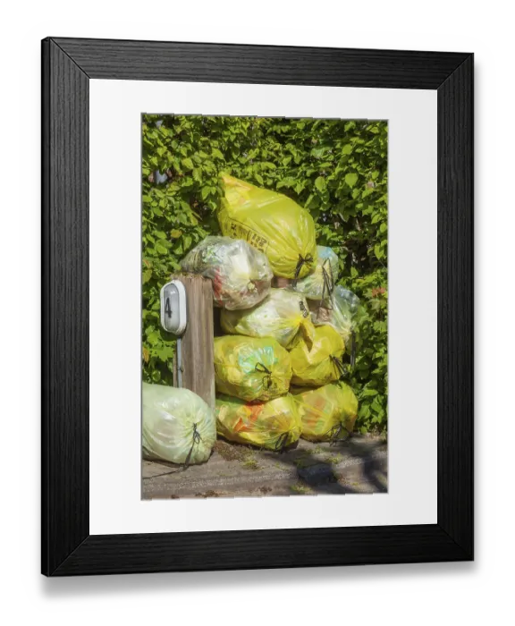 Framed Print : Stacked yellow bags for plastic waste, Germany