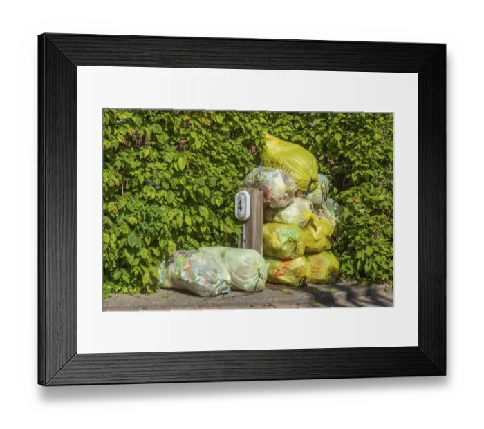 Framed Print : Stacked yellow bags for plastic waste, Germany Framed Print : Stacked yellow bags for plastic waste, Germany