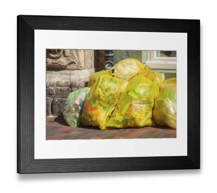 Framed Print : Stacked yellow bags for plastic waste, Germany Framed Print : Stacked yellow bags for plastic waste, Germany