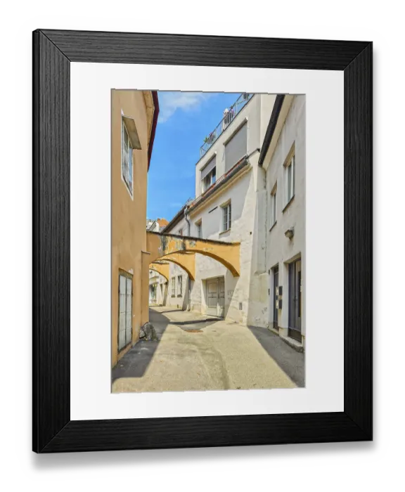 Framed Print : Beige arcade in a sunny, narrow old town street with blue sky Krems Waldviertel Lower Austria Austria