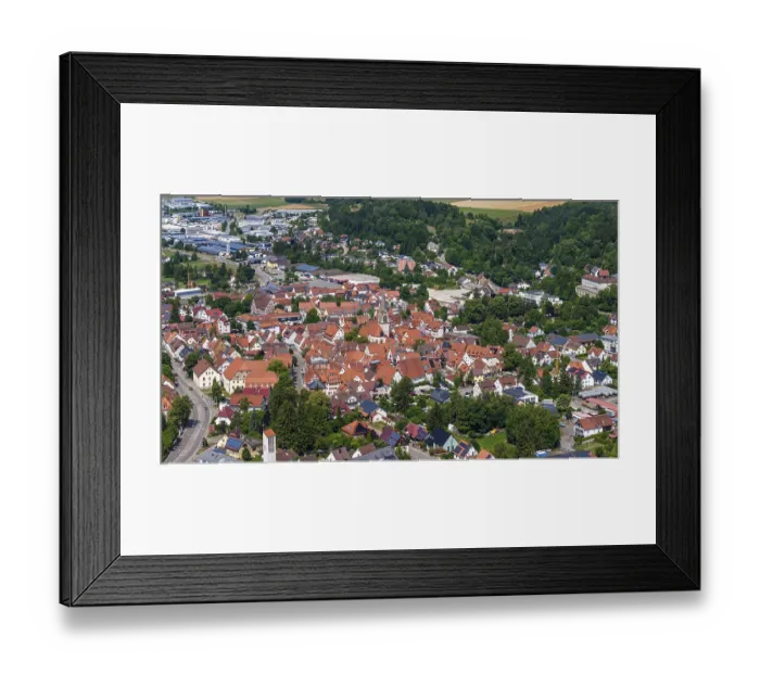 Framed Print : Town view of Munsingen on the Swabian Alb with town hall and church