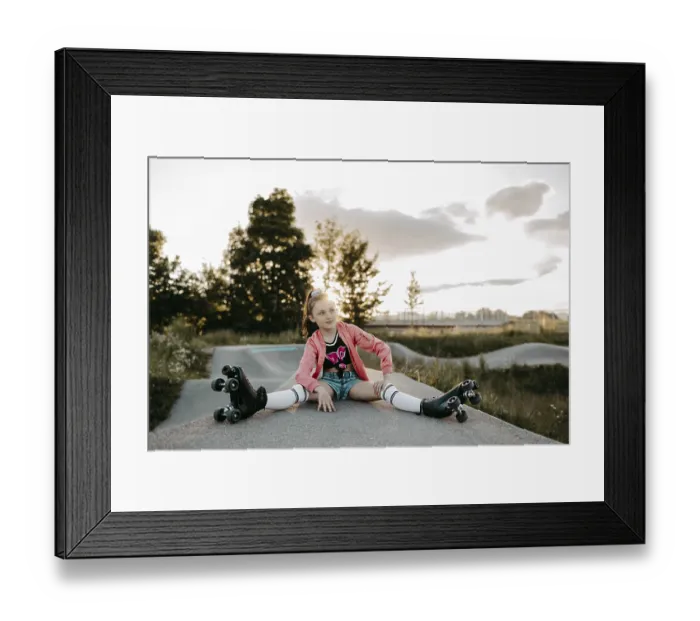 Framed Print : Girl with roller skates on a skating rink Framed Print : Girl with roller skates on a skating rink