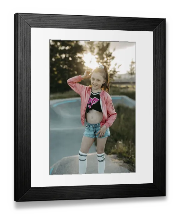Framed Print : Girl with roller skates on a skating rink