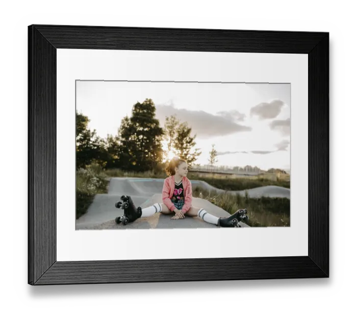 Framed Print : Girl with roller skates on a skating rink