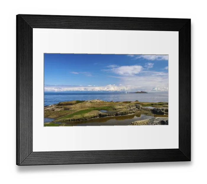 Framed Print : A small sailboat passes between Entrance Island and Orelbar Point on Gabriola Island