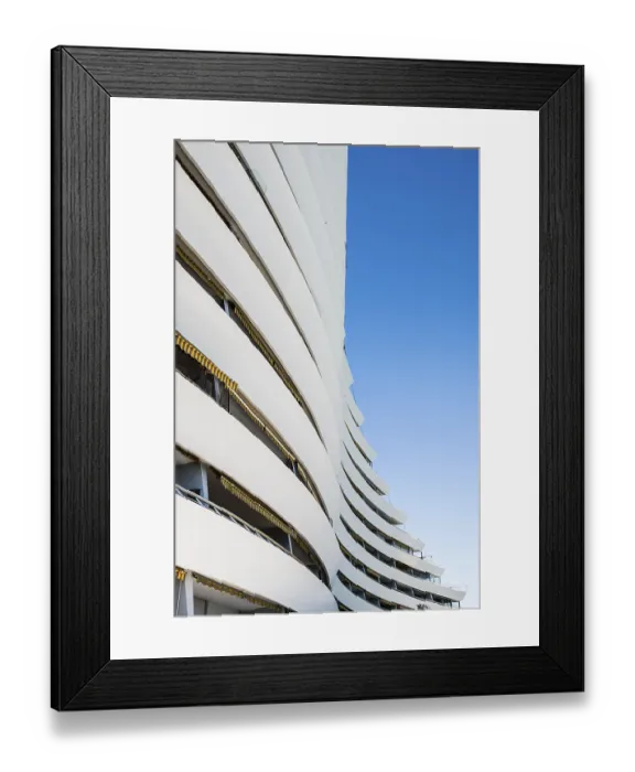Framed Print : High-rise flat blocks by the sea Framed Print : High-rise flat blocks by the sea
