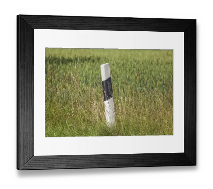 Framed Print : Road marker post on a country road Framed Print : Road marker post on a country road