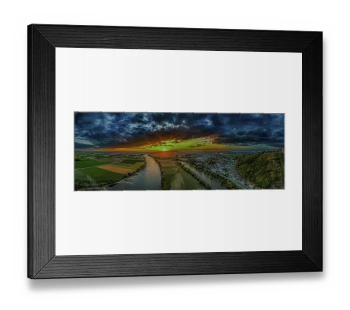 Framed Print : Extensive river landscape at sunset with vivid colours