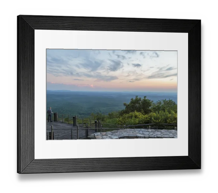 Framed Print : Man looking out over the valley at sunset from the Vista Cliffside Restaurant in Cheaha State Park near Delta