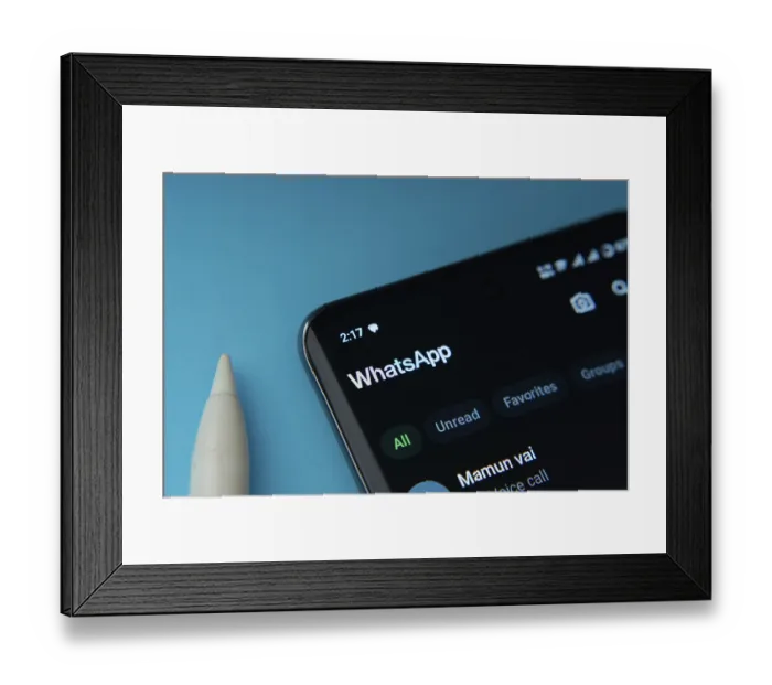 Framed Print : Dhaka, Bangladesh- 04 July 2025: A smartphone displaying the WhatsApp homepage