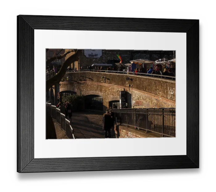 Framed Print : A brick bridge with market stalls and people