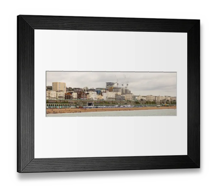 Framed Print : A coastal scene with a long stretch of beach