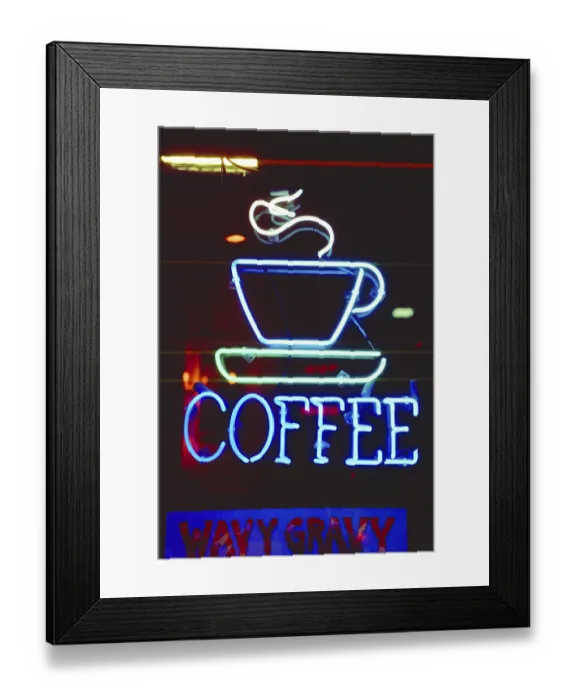 Framed Print : Illuminated advertising at a coffee shop
