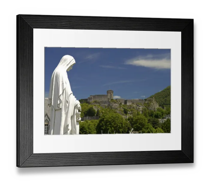 Framed Print : Statue on Rosary Square and the Chateau fort de Lourdes fortress in the Marian pilgrimage town of Lourdes Framed Print : Statue on Rosary Square and the Chateau fort de Lourdes fortress in the Marian pilgrimage town of Lourdes