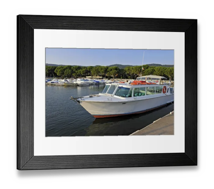 Framed Print : Excursion boat, motorboat and yachts in the marina of Bolsena Framed Print : Excursion boat, motorboat and yachts in the marina of Bolsena