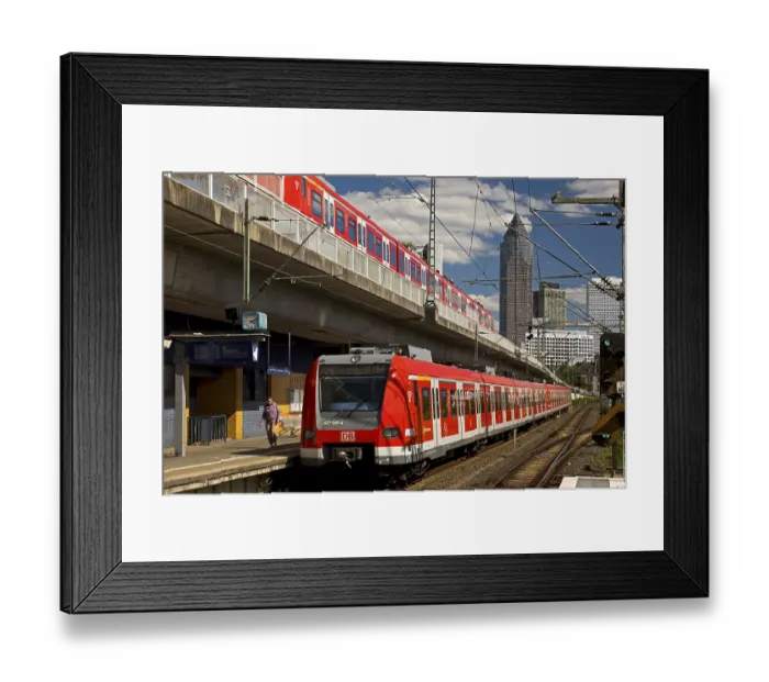 Framed Print : Two regional express trains on different levels at Frankfurt West station with Messeturm Framed Print : Two regional express trains on different levels at Frankfurt West station with Messeturm