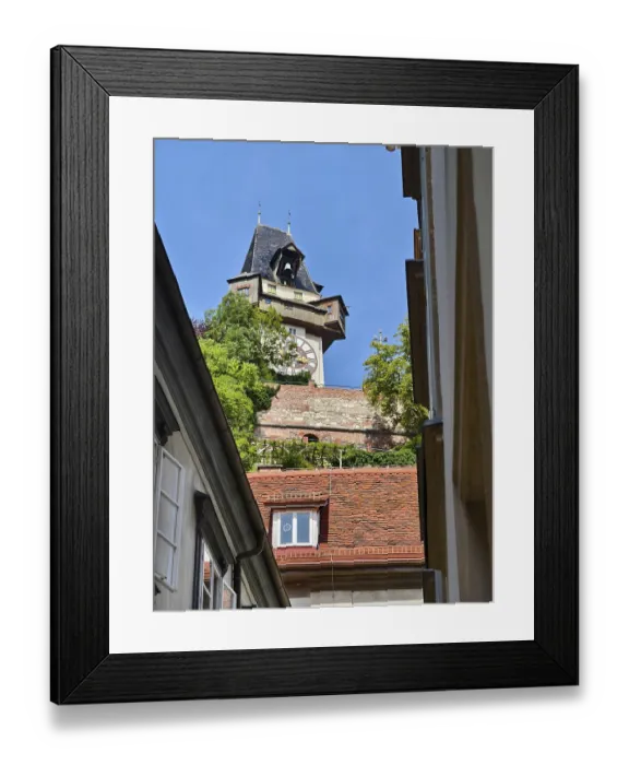 Framed Print : Historic clock tower towers over rooftops