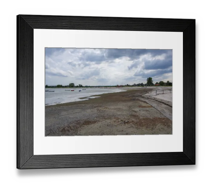Framed Print : A wide beach under a cloudy sky Framed Print : A wide beach under a cloudy sky