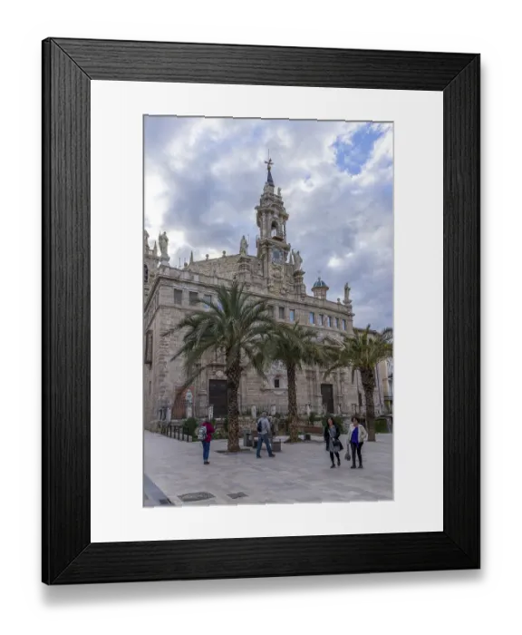 Framed Print : Facade of the old catholic church Real Parroquia de los Santos Juanes Valencia in the street Pl