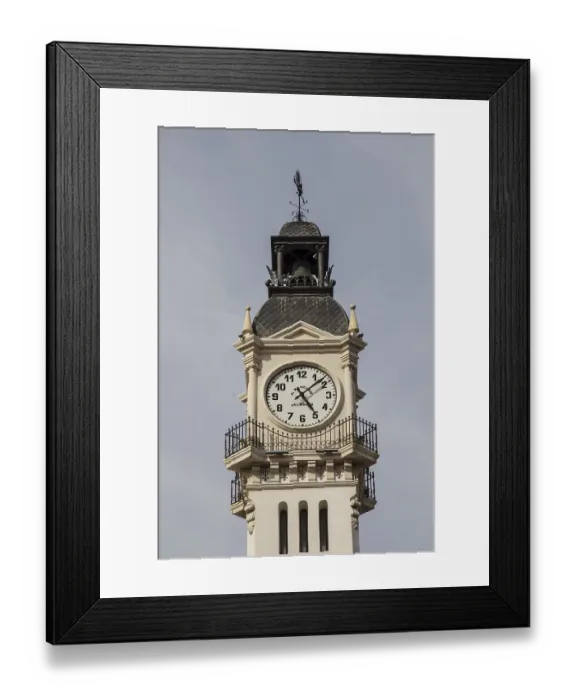 Framed Print : A historic clock tower with detailed architecture against a clear sky Framed Print : A historic clock tower with detailed architecture against a clear sky