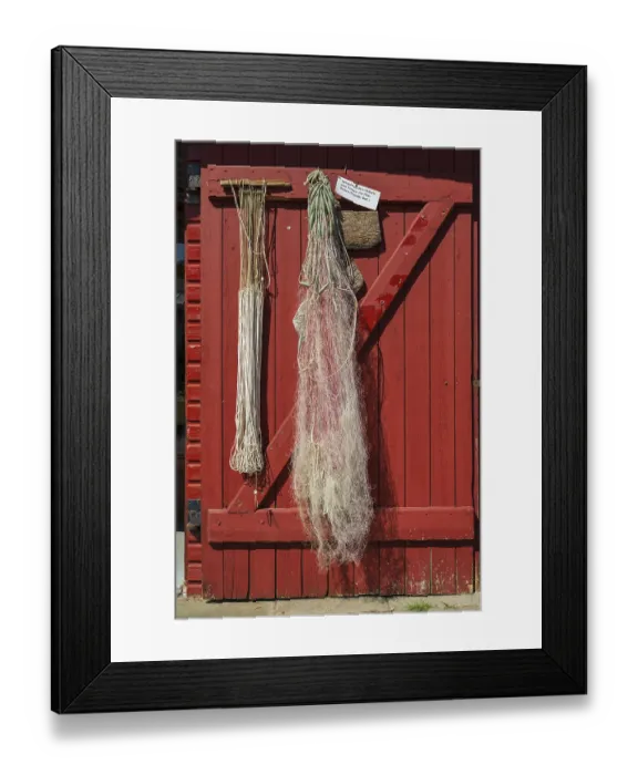 Framed Print : Rope and fishing net on a wooden door Framed Print : Rope and fishing net on a wooden door