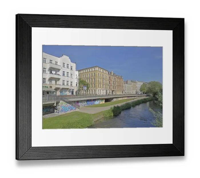 Framed Print : Historic houses on the Robert-Franz-Ring with millrace