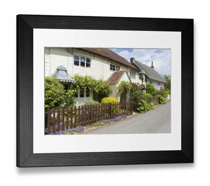 Framed Print : Attractive historic cottages in village of Avebury