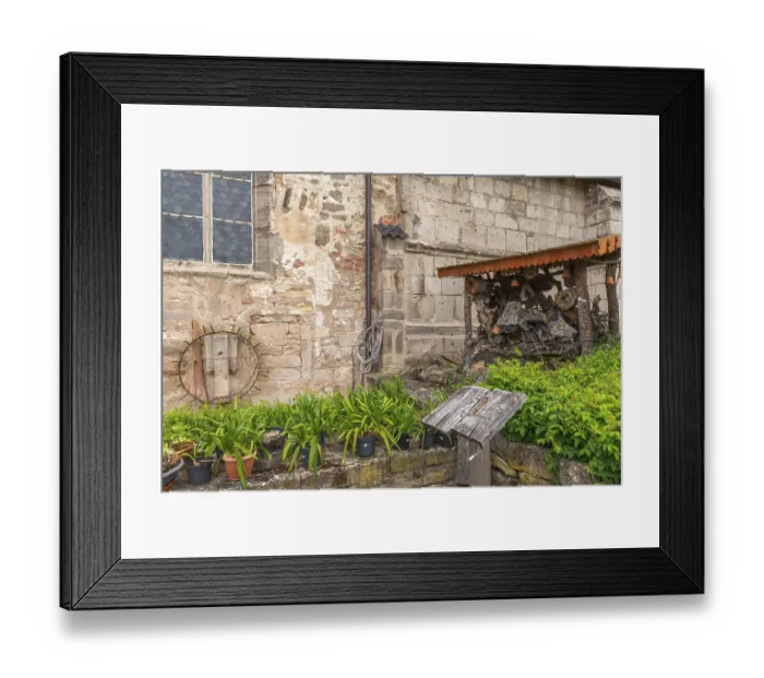 Framed Print : Church and bible garden of St Crucis Church Framed Print : Church and bible garden of St Crucis Church