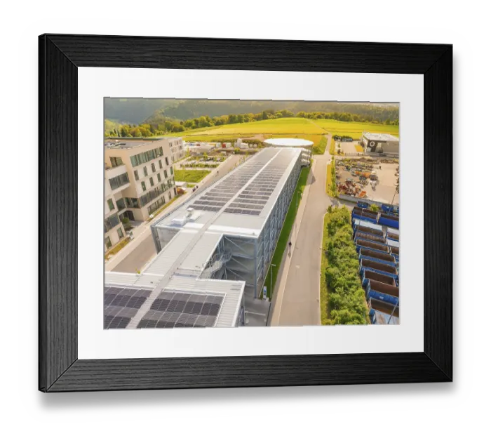 Framed Print : View of a long building roof with solar panels in a progressive Framed Print : View of a long building roof with solar panels in a progressive