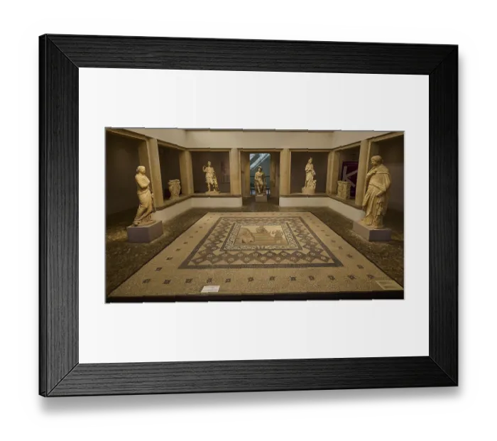 Framed Print : A room in a museum with several ancient sculptures and a decorated floor mosaic