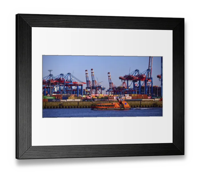 Framed Print : HADAG's harbour ferry MS Kehrwieder in front of the container gantry cranes at the Burchardkai container terminal Framed Print : HADAG's harbour ferry MS Kehrwieder in front of the container gantry cranes at the Burchardkai container terminal
