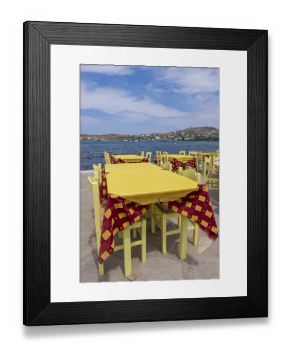 Framed Print : Tables in a restaurant by the sea in Parikia