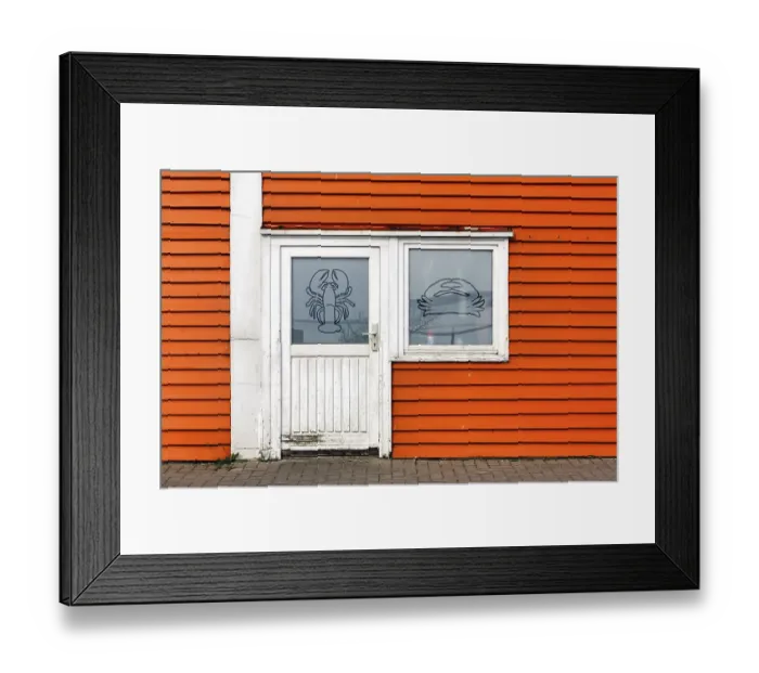 Framed Print : Colourful lobster shack, orange wooden facade with door and window
