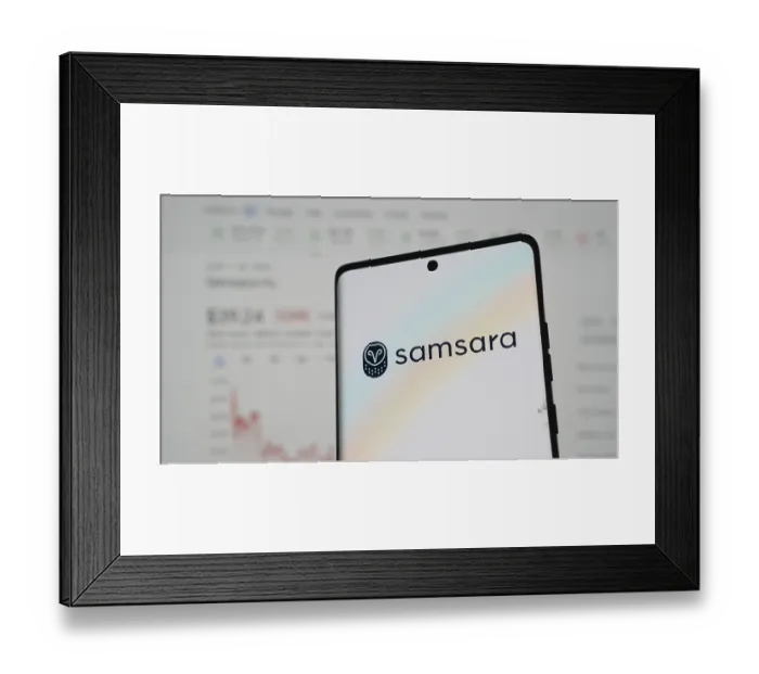 Framed Print : Samsara logo on a smartphone with pastel hues and financial chart in the background