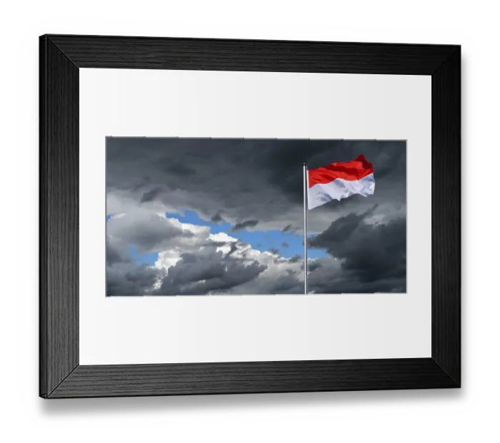 Framed Print : Dramatic sky with national flag of Indonesia in strong wind Framed Print : Dramatic sky with national flag of Indonesia in strong wind