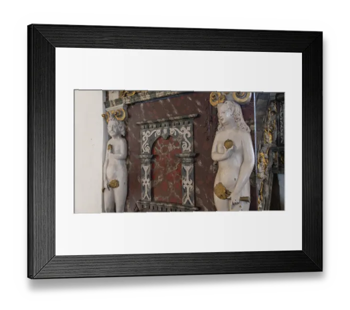 Framed Print : Sculptures of Adam and Eve, medieval church Framed Print : Sculptures of Adam and Eve, medieval church