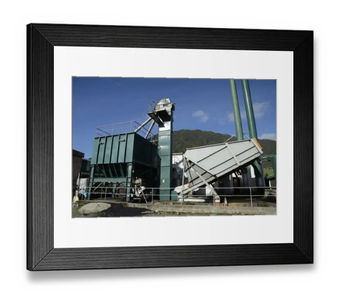Framed Print : An engineer feeds coal into the hopper that fuels a boiler for a rendering plant Framed Print : An engineer feeds coal into the hopper that fuels a boiler for a rendering plant