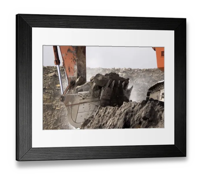 Framed Print : 190 ton digger picks up a load of rock overburden at an open cast coal mine