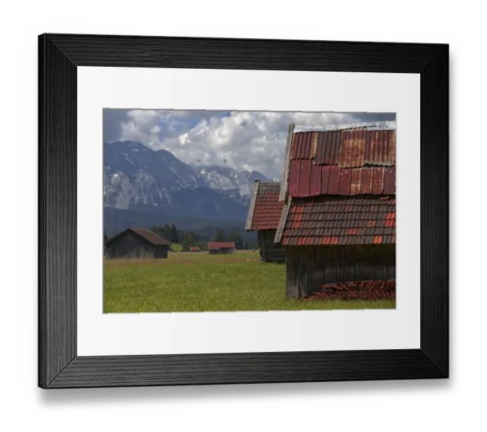 Framed Print : An alpine panorama with several barns Framed Print : An alpine panorama with several barns