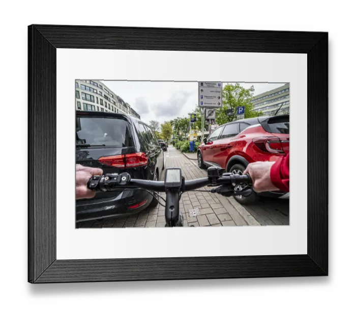 Framed Print : Cycling in the city, inner-city street Framed Print : Cycling in the city, inner-city street