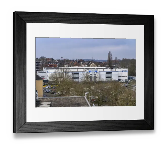 Framed Print : The ice rink in Essen-West, residential building
