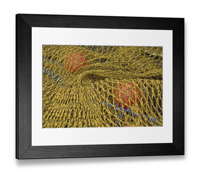 Framed Print : Close-up of a yellow fishing net with red floats and blue rope