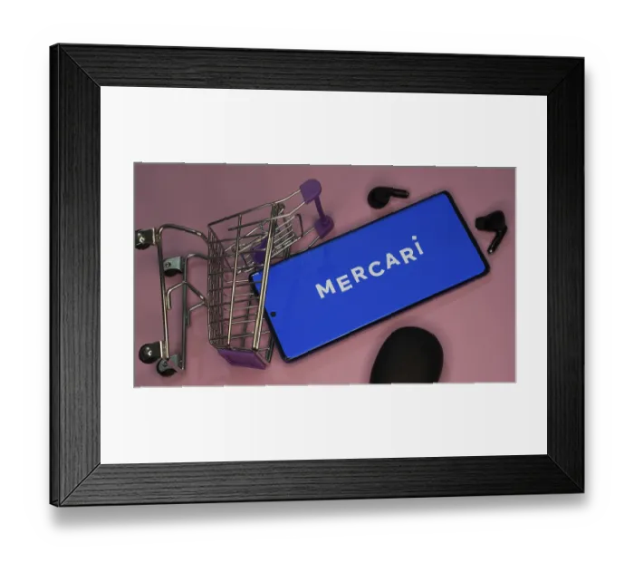 Framed Print : Smartphone with website of Japanese e-commerce company Mercari Inc